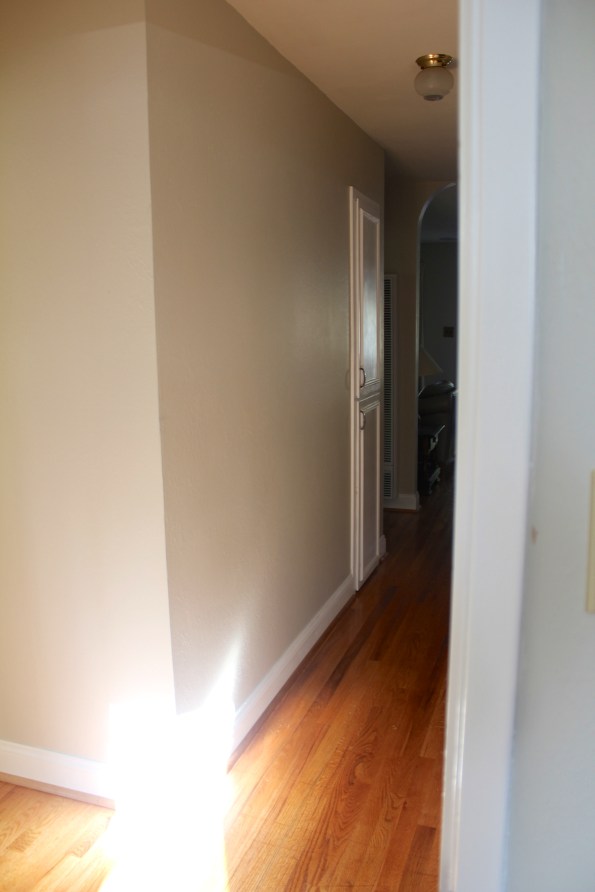 Boring hallway. Even though it has beautiful floors, baseboard, trim, and paint, it needed a little excitement!